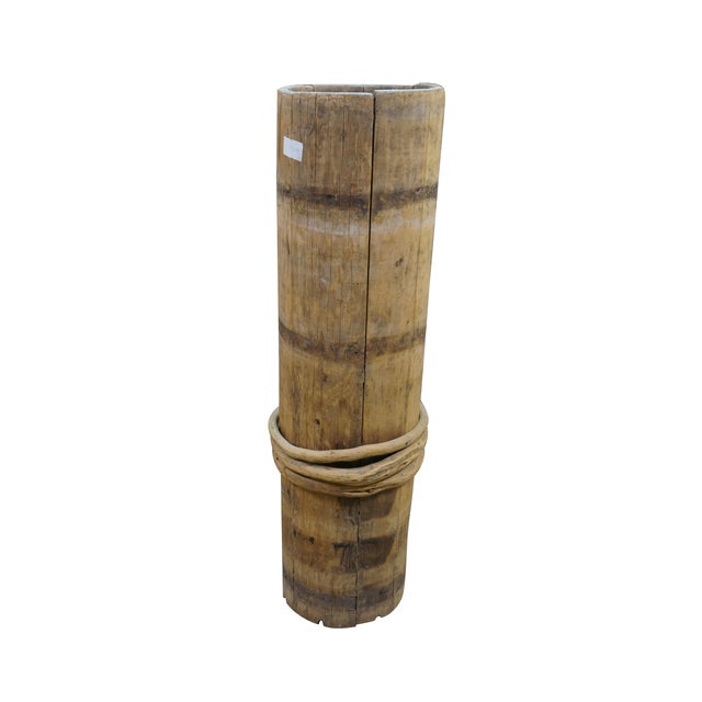 Antique Tibetan butter churn (butter barrel / milk bucket) made from wood and bound with willow or wooden bands....