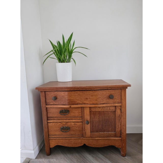 A charming and characterful piece of American Victorian furniture, this late 19th-century oak washstand is a wonderful...
