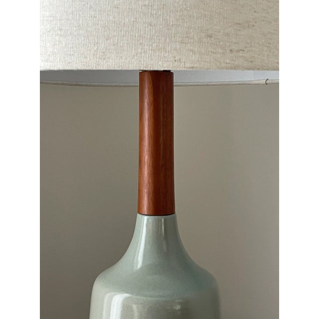 A unique table lamp designed by famed ceramacist duo Jane and Gordon Martz for Marshall Studios. Features a glazed body...