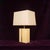 Elegant table lamp designed by Tommaso Barbi in the 1970s, characterized by a refined geometric composition combining a...