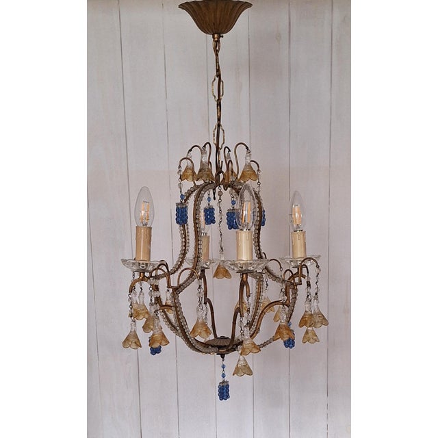 Mid-Century Italian 4-Light Chandelier with Colored Glass Hangings, 1950s, in Good conditions. Designed 1950 to 1959...