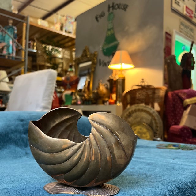Up for consideration is a beautiful vintage nautilus shell brass planter. This would look lovely in your home and it is a...