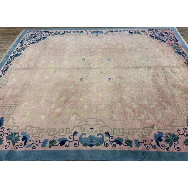 "This is a gorgeous and highly authentic room-sized antique Chinese rug, cataloged under Stock #7090. Measuring a very...