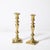 This elegant near pair of Neoclassical candleholders, crafted in the United States, circa 1900. These showcase the...