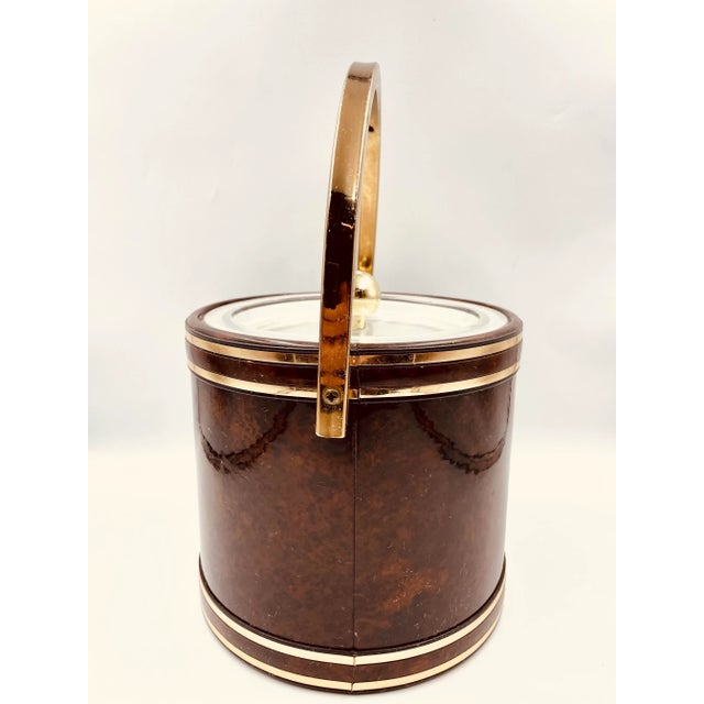 “Home accessories… Beautifully in tune with today's Good Life!” ~ Georges Briard This swanky ice bucket from one of the...