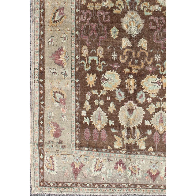 Mid 20th Century Vintage Turkish Oushak Rug in Brown Background With All-Over Floral Design For Sale - Image 4 of 8