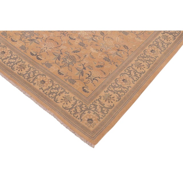Enhance the ambiance of your home with this magnificent Persian-influenced Turkish hand-knotted rug made by skilled...