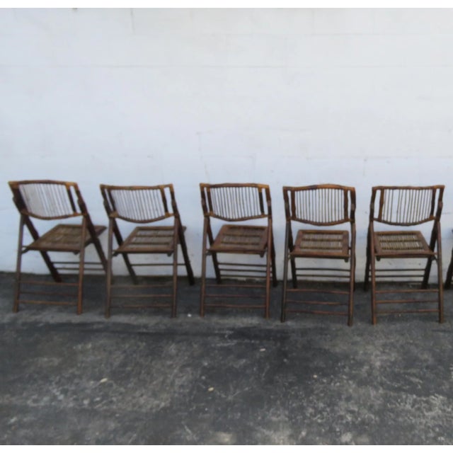 This Set of Five Folding Dining Chairs is made out of wood, and bamboo. The chairs fold and it make it a great set for a...