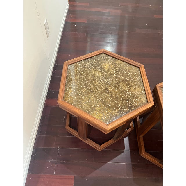 Pair of Mid-Century side tables. Designed by John Keal for Brown Saltman. Walnut with gold/copper constellation design...