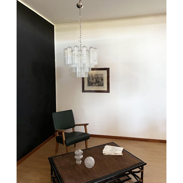 Italian vintage chandelier in Murano glass and nickel-plated metal structure. The armor polished nickel supports 36 large...