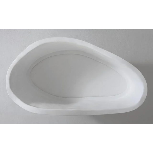 Pair of favo shelves by Imperfettolab Dimensions: 103 x 33 x H 56 cm 63 x 32 x H 48 cm Materials: Fiberglass