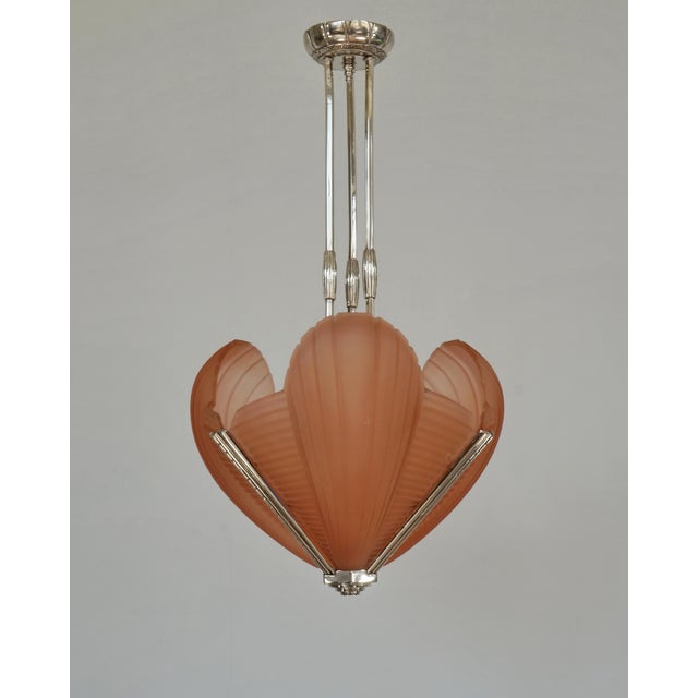 H. Petitot A French 1933-1938 art deco chandelier in nickel plated solid brass or bronze by the famous Paris based company...