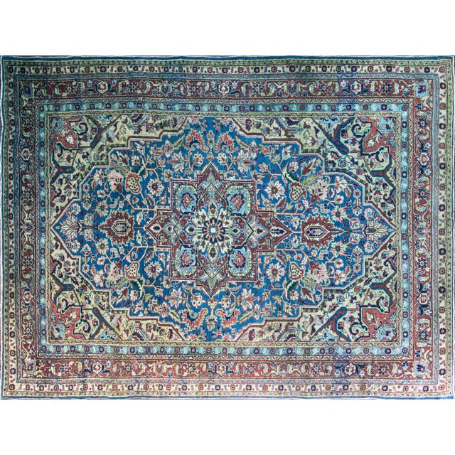 Antique Persian Heriz/Serapi, hailing from the Iranian province of Eastern Azerbaijan and the encompassing Heriz region,...