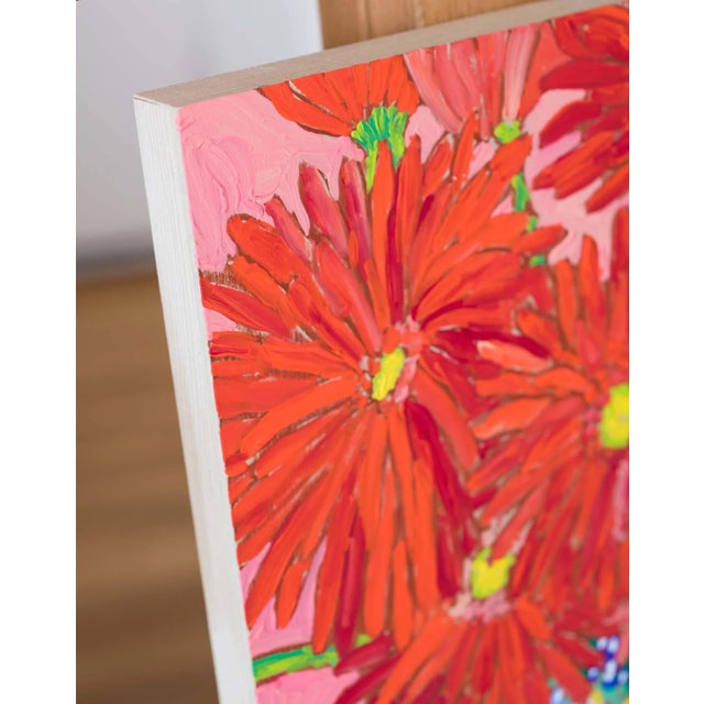 This extraordinarily long lasting bouquet of gorgeous bright orange Gerber daisies sat on my dining room table for weeks!...