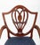 A very good set of twelve hepplewhite style mahogany dining chairs, comprising ten standard chairs and two elegant carvers...