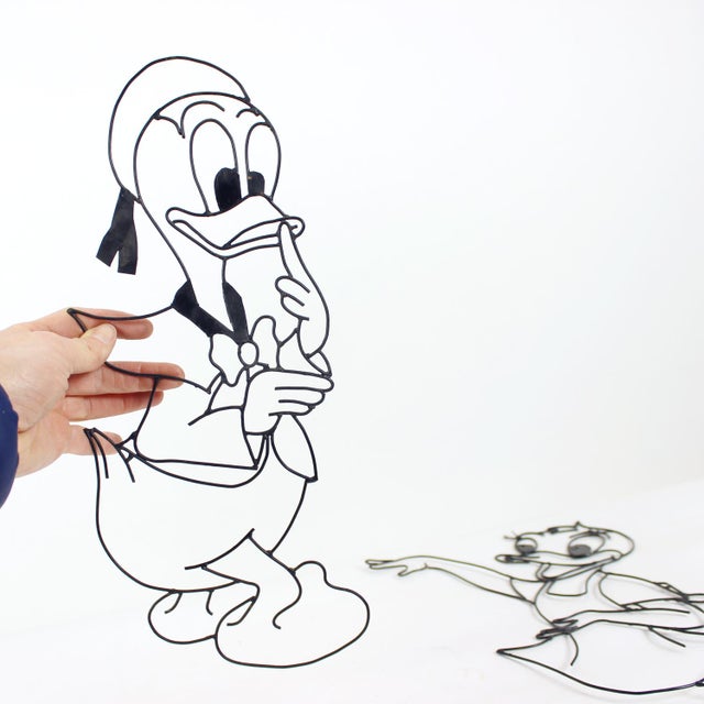 A charming set of two vintage Disney wall decorations produced in Austria in the 1960s, featuring the beloved characters...