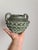 A stunning Spanish handcrafted vase with a powerful design, dating from the Mid-Century period, circa 1960. This piece...