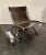 A stunningly rare leather & chrome scissor lounge chair, by Paul Tuttle and Antonio Citterio for Flexform Italy designed...