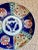 Beautiful vintage Imari plate in blue, green, orange and gold. Excellent condition with no chips or cracks. 9.5" diameter.