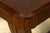 1930s French Art Deco walnut console table, sourced in Provence, France. The console features a long rectangular top with...