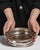 This early 20th century Victorian decorative object from United Kingdom is finished in silver. Its design carries the...
