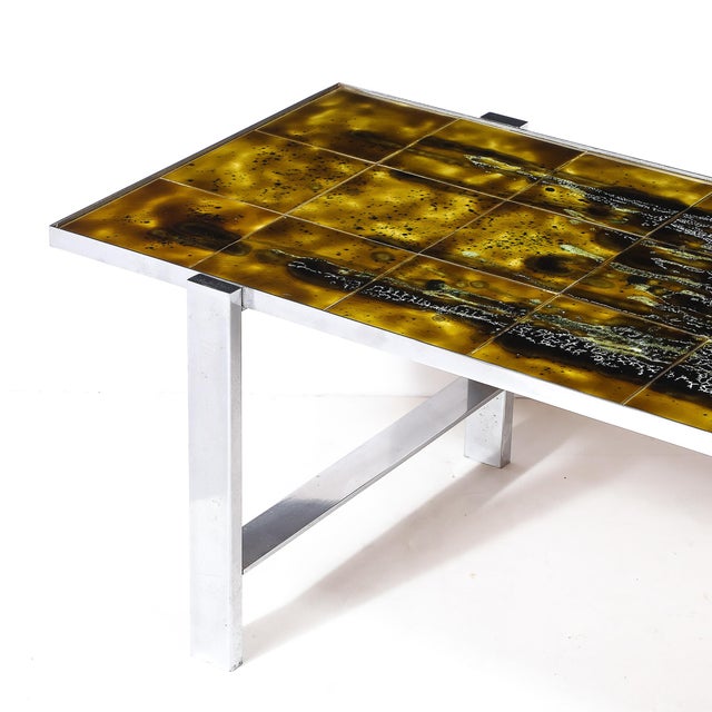 This Mid-Century Ceramic Tile & Polished Aluminum Coffee Table by Juliette Belarti embodies the perfect balance between...