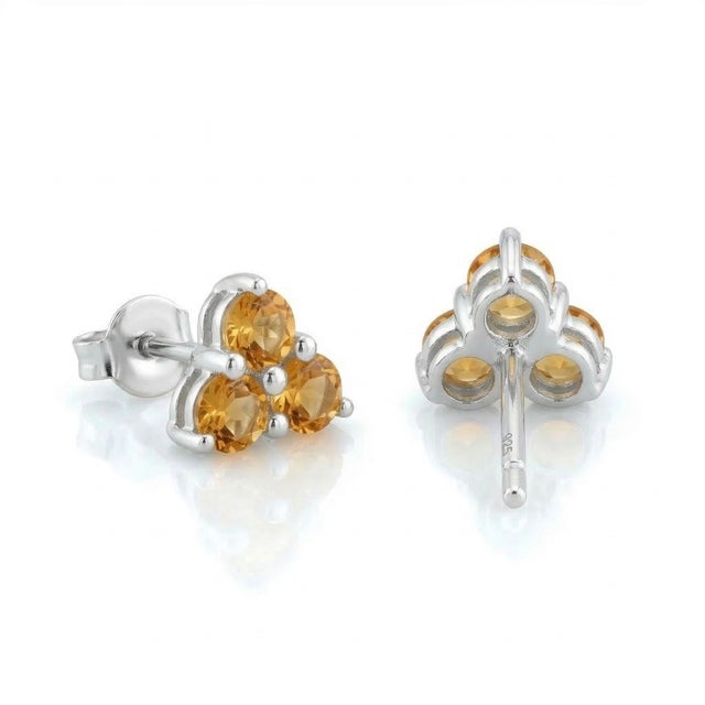 These elegant stud earrings feature a radiant cluster of Citrine gemstones, admired for their warm golden-yellow hue and...