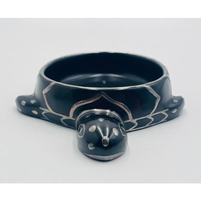 Whimsical yet refined, this sculptural turtle catchall or bottle coaster was designed and handcrafted in Taxco, Mexico by...