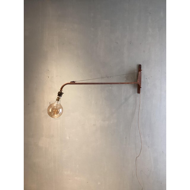 Prouve Light Wall Lamp by Jean Prouvé, in Very Good conditions. Designed 1950 to 1959 This piece is designed in the style...