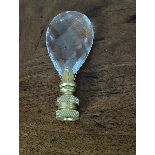 Antique cut crystal lamp Finial on brass base.