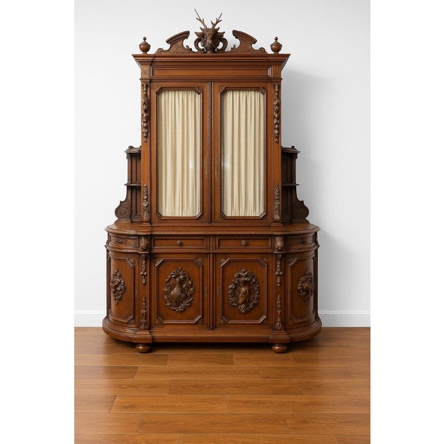 Important two-part buffet in solid walnut, richly carved, Renaissance style / 19th century. This high-quality piece is...
