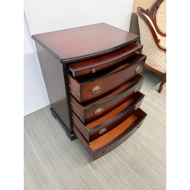 Design Plus Gallery presents a Hepplewhite Style Dresser from Bombay Company. The dresser has a distinctive bow-front with...