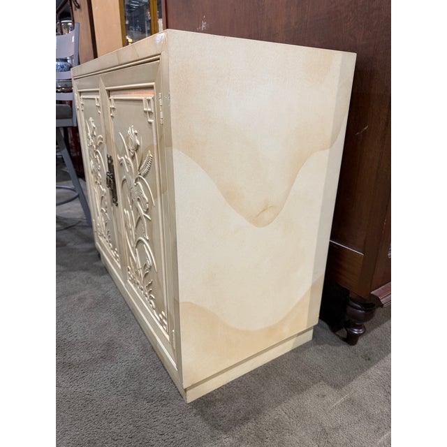 An exceptional example of Henredon’s refined craftsmanship, this goatskin-clad cabinet exudes understated luxury with a...