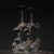 This is a rare and exquisite pair of antique Chinese bronze candle holders featuring a majestic red-crested crane standing...