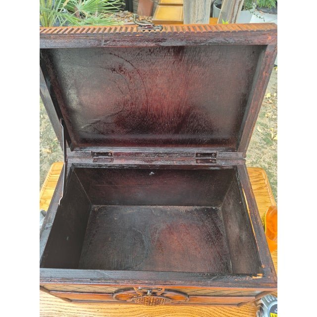 Add graphic texture and rich vintage charm to your space with this mid-century modern bohemian decorative storage box....
