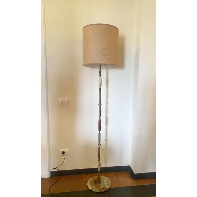 This stunning floor lamp exemplifies the ability of Italian artisans to create products that seem unique. The choice of...