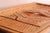 This carved wooden serving tray embodies traditional craftsmanship with a touch of rustic elegance. Its detailed design...