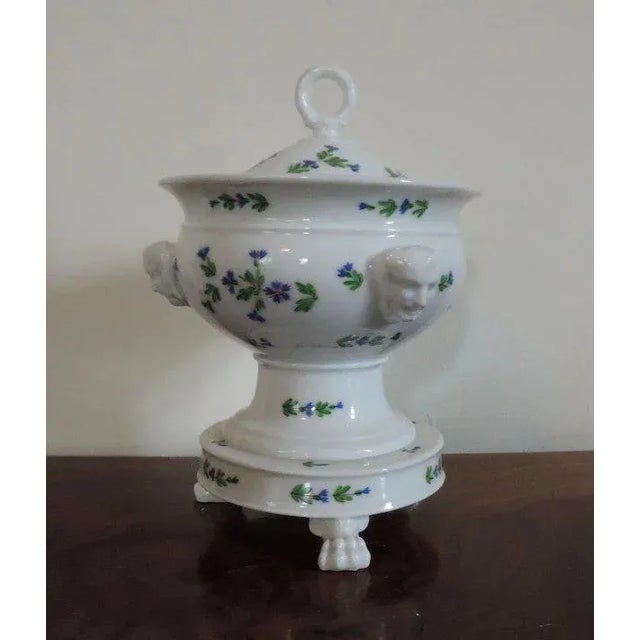 Antique 19th c. French porcelain sprig compote and over. Large animal paw feet, applied masks and loop handle to the...