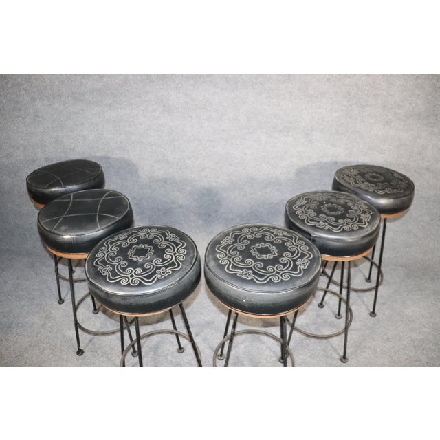 Set of six midcentury stools made of strong iron with vinyl seats. Simple 60s style for indoor or outdoor use.