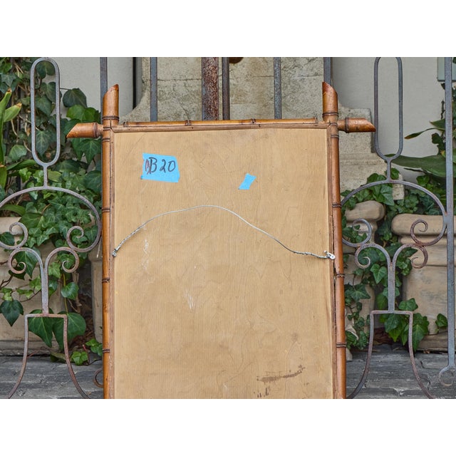Crafted in France at the turn of the 20th century, this faux bamboo mirror captures the enduring appeal of the exotic...