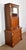 Massive mahogany furniture in two elements, with a lower, wider part, the frame of which is cutting and the sides with...