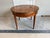 Antique French Louis XVI Style Inlaid Center Table with the star-burst pattern of inlaid wood on the round top. Brass...