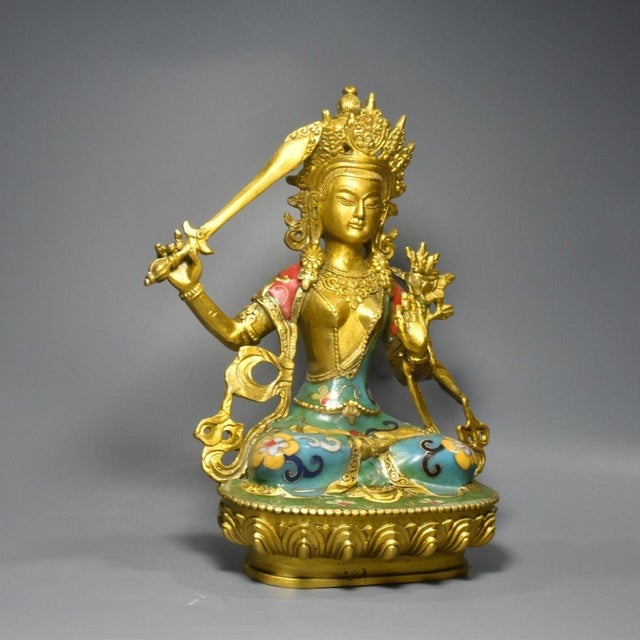 This is a finely crafted antique cloisonné enamel sculpture of Manjushri Bodhisattva, the Bodhisattva of Wisdom in...
