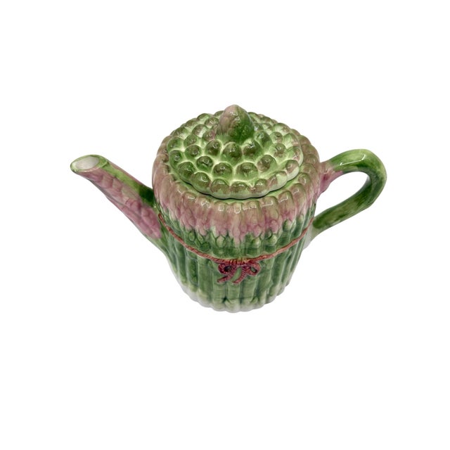 Vintage teapot decorative as asparagus adorn with greens pinks and whites. This is great for decoration or even serving!...