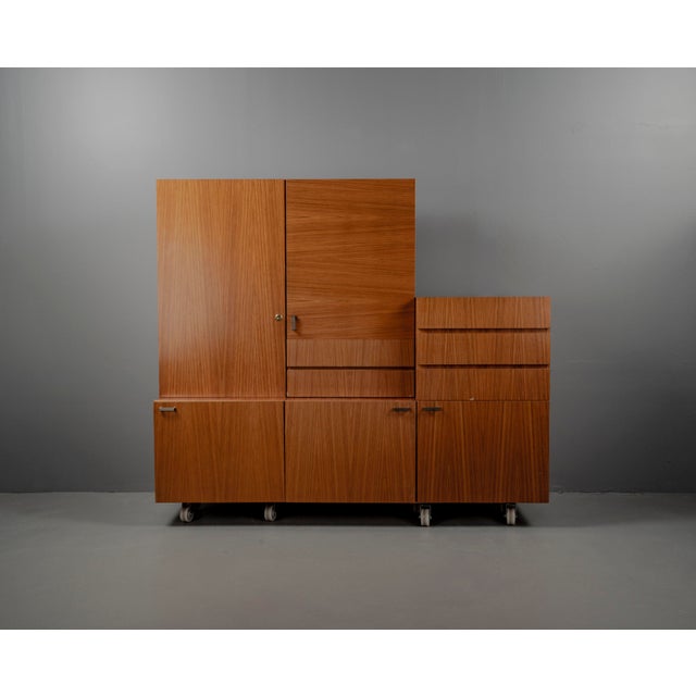This modular sideboard by Herford Möbel combines thoughtful functionality with classic design. As part of a flexible...
