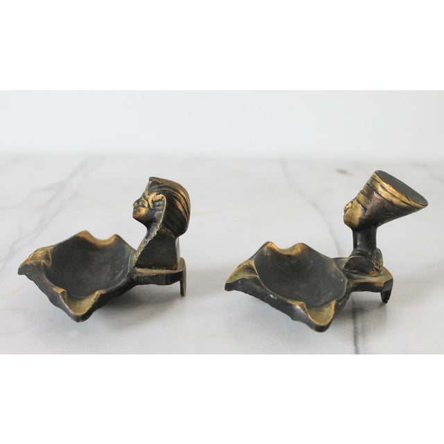 Pair of vintage cast brass Egyptian figural ashtrays. No makers mark. Patina.