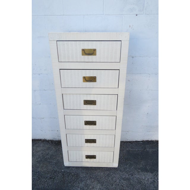 This Lingerie Chest is made out of wood, solid wood, laminated, wicker, and metal. This Lingerie Chest has Hollywood...