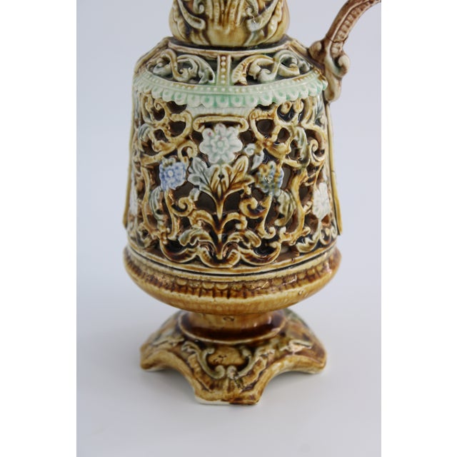 Lovely Antique Majolica Ewer / Pitcher / Vase with Griffon Handle and Reticulated Pierced Body. Stamped England and with a...