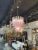 Stylish modern pink Murano glass saddle form chandelier. Beautiful scale and shape and lovely glistening glass. Gorgeous!!