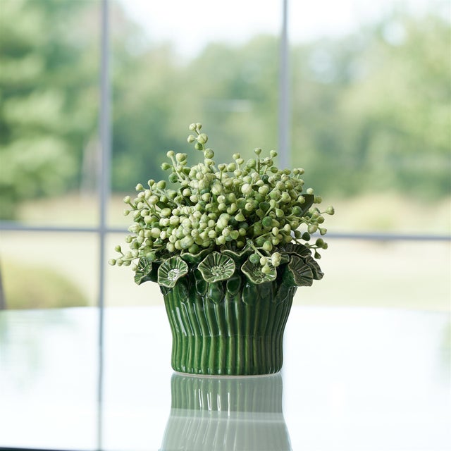 Add a soft, earthy charm to your space with the Stoneware Bud Vase with Floral Accent Set. Featuring warm green tones with...
